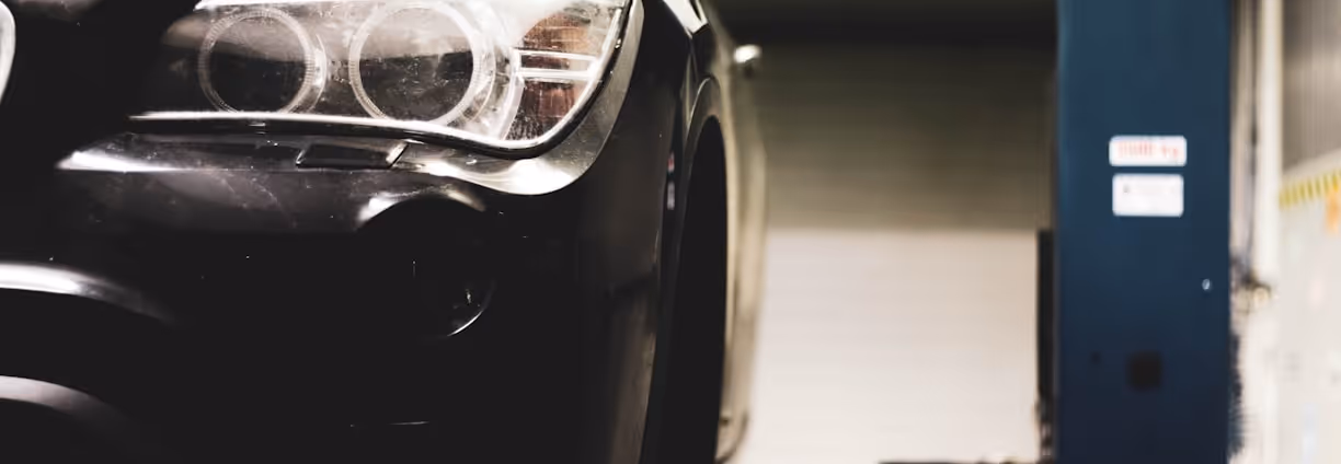 black car in grayscale photography